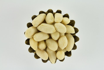 Handful of pine nuts in figured form