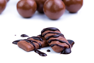 Chocolate candies on a white background.