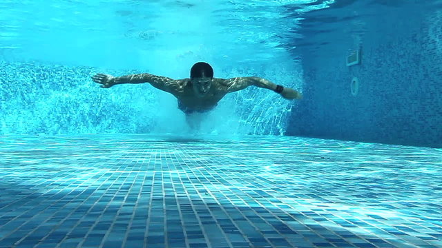 Man swimming under water