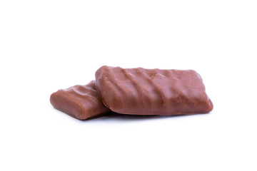 Chocolate candies on a white background.