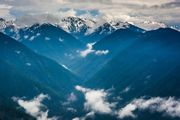 View of the snowy Olympic Mountains and low clouds from Hurrican