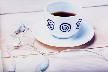cup of tea and headphones