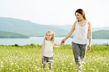 mother and daughter in field