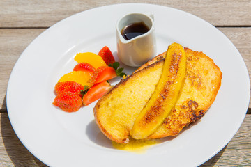 Delicious breakfast of fresh fruit on a plate 