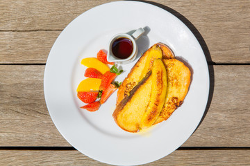 Delicious breakfast of fresh fruit on a plate 
