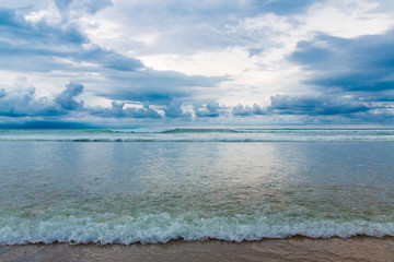 Tropical beach and beautiful sea. Blue sky with clouds in the ba