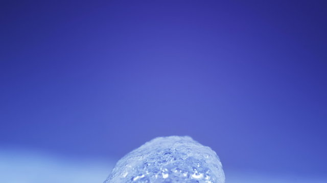 thawing ice extremly close-up timelapse 4k (4096x2304)