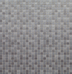 Grey and black mosaic wall texture and background