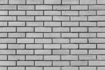 White brick stone wall seamless background and texture