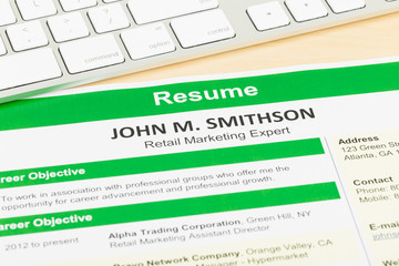 Resume with keyboard, document and information are mock-up