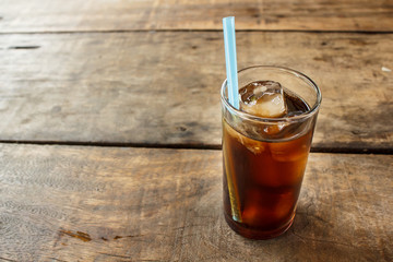 Soft drink on wood table.