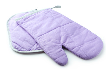 Purple kitchen glove and potholder isolated on white