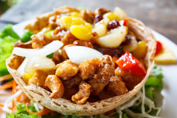 Stir fried chicken with cashew nuts.