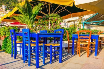 Blue wooden tables and chars in restaurant