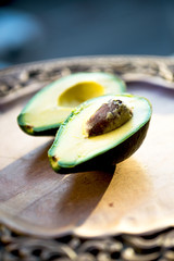 fresh avocado on wooden table