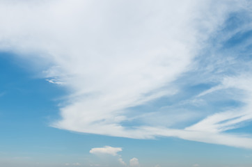 Obraz premium Blue Sky with Big Beautiful Cloud in Hurricane Shape