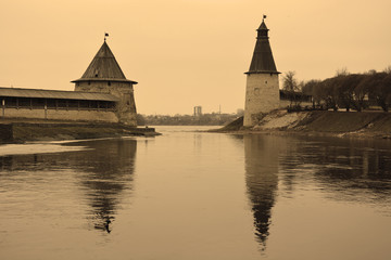 Fototapeta na wymiar Pskov Kremlin in sepia tone. View from Pskova river