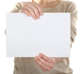Woman holding blank card close up