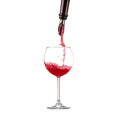 red wine pouring into wine glass isolated