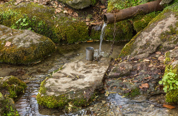Source and mug on a chain
