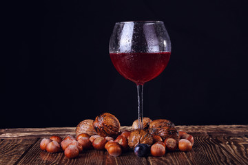 Wine on the old wooden background