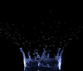 brilliant drops transparent water on black background