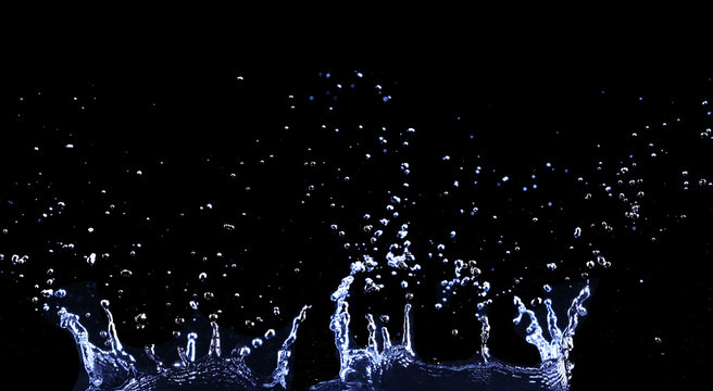 brilliant drops transparent water on black background