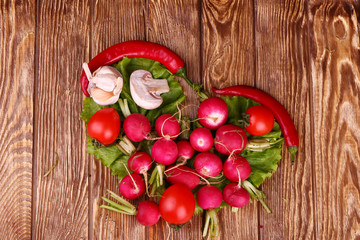 Radish on wooden background
