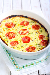 Courgette, peas, cheese and tomato frittata