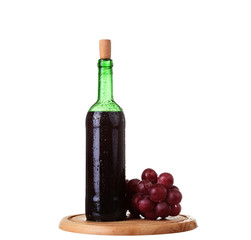 wine glass with red wine, bottle of wine and grapes isolated over white background