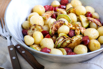 New potato with sausages and courgette cooked