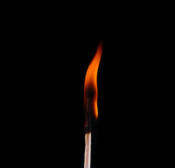 Ignition of a match, with smoke on dark background