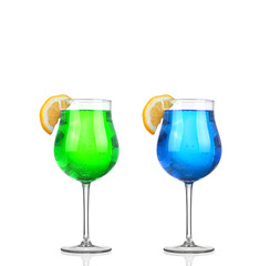 Set of beautiful shot glasses filled with colored alcoholic cocktails