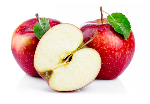 Red apples with leaf and half section isolated on a white
