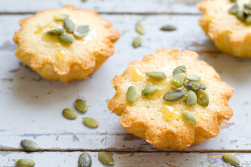 Cakes with pumpkin seeds and honey