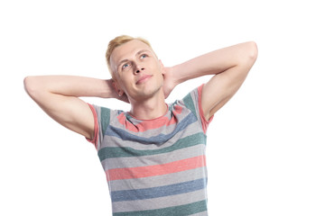 Man with arms behind his head