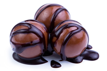 Chocolate candies on a white background.