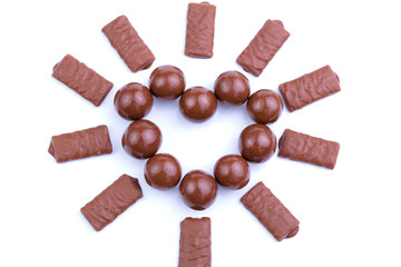 Chocolate candies on a white background.