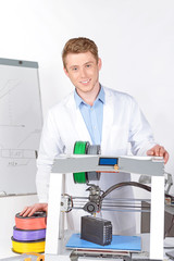 Scientist working with three-dimensional  printer