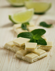 White chocolate with mint and lime, selective focus