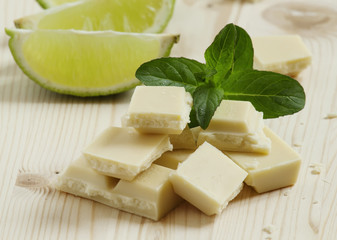 White chocolate with mint and lime, selective focus