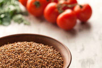 Ceramic bowl with buckwheat.
