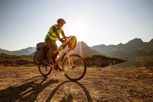 Biking in Norway against picturesque landscape
