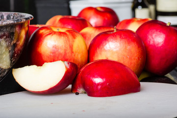 Fototapeta na wymiar Red apples cut and cored
