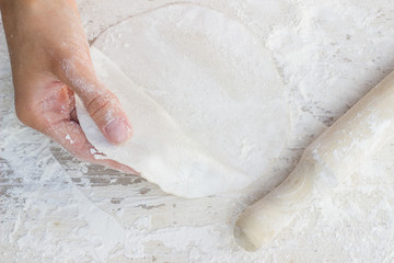 Homemade dough. Cooking pizza