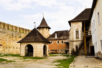 Old buildings in the courtyard of a medieval fortress
