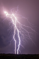 Naklejka na ściany i meble Thundebolts and lightnings in a stormy night