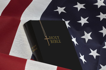 Bible and Gold Cross on American USA  Flag