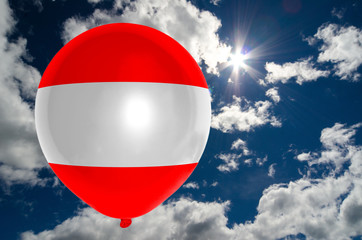 balloon with flag of austria on sky