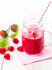Healthy fruits smoothie drink with raspberries